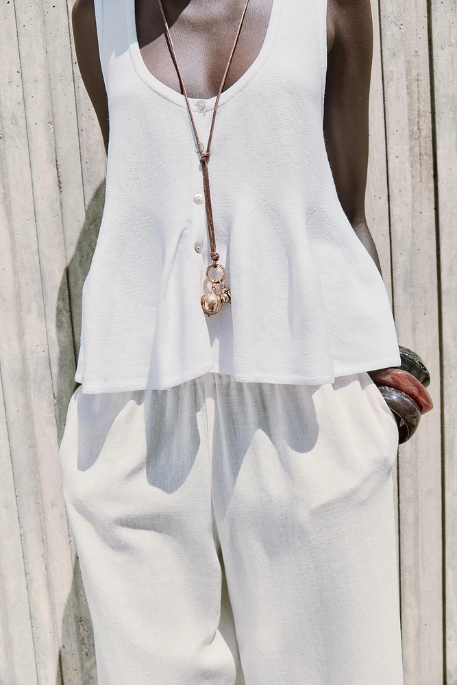 TOP EN MAILLE PÉPLUM