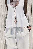 TOP EN MAILLE PÉPLUM