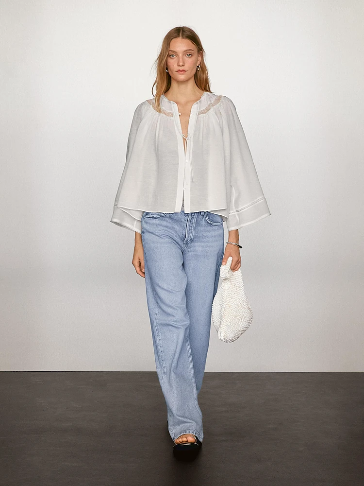 Flowing blouse with lace detail