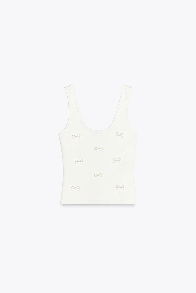 T-SHIRT LACETS STRASS PERLES