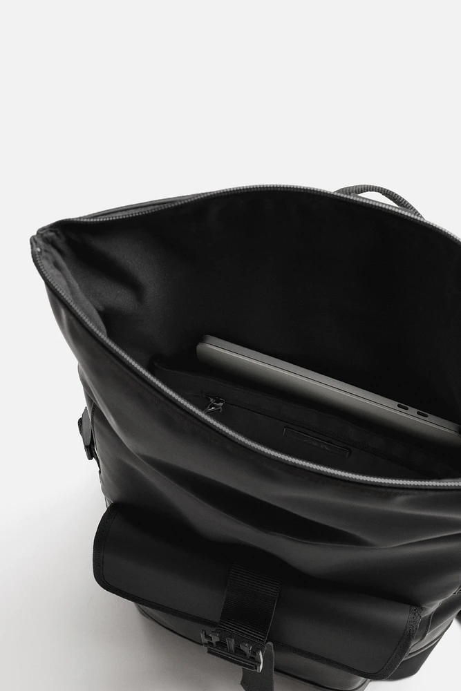 RUBBERIZED FLAP BACKPACK