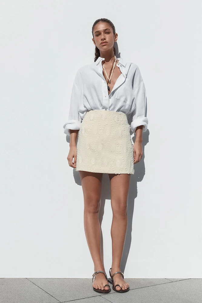 MINI SKIRT WITH FRAYED EMBROIDERY