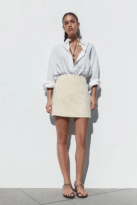 MINI SKIRT WITH FRAYED EMBROIDERY
