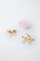LOT DE TROIS PINCES COQUILLAGE ET ÉTOILES