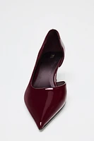 ASYMMETRIC HEELED SHOES