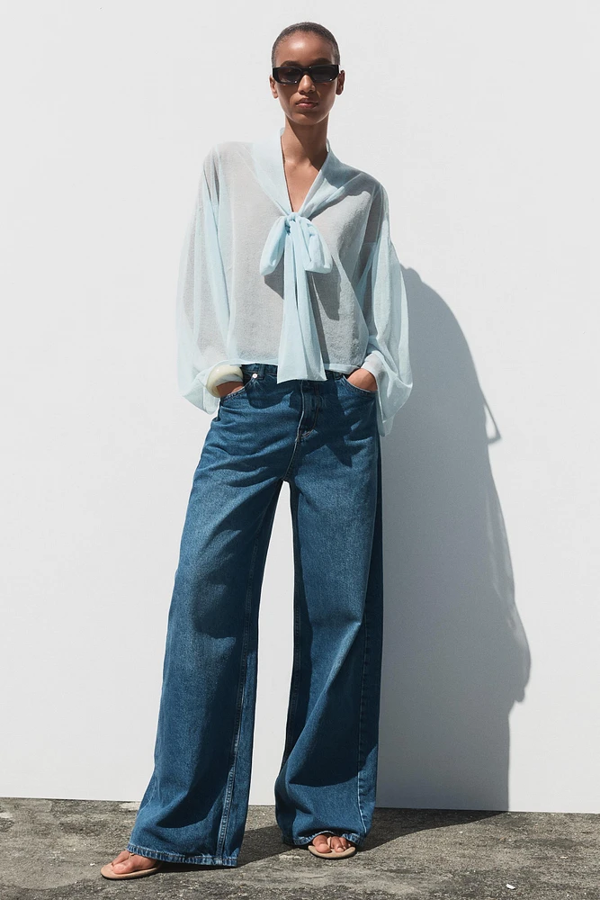 BLOUSE SEMI-TRANSPARENTE EN MAILLE