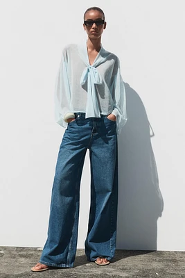 BLOUSE SEMI-TRANSPARENTE EN MAILLE