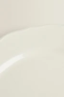 EARTHENWARE DINNER DISH WITH RAISED-DESIGN EDGE