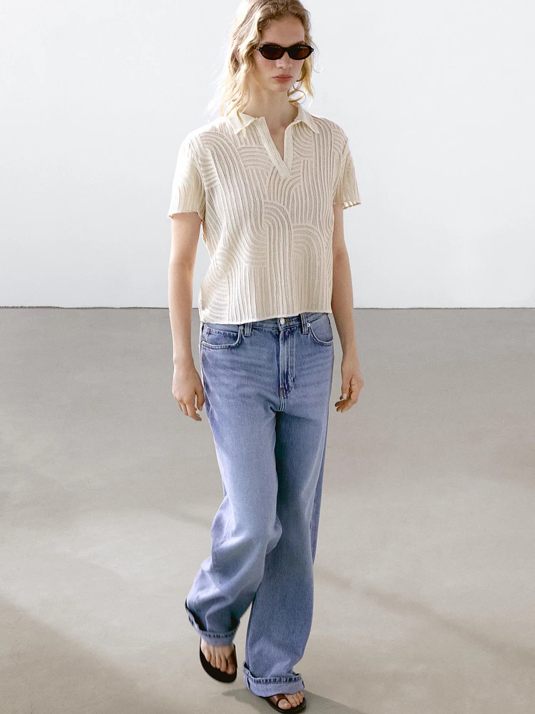 Polo en maille ajourée avec broderie