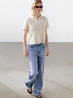 Polo en maille ajourée avec broderie