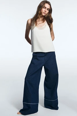 CONTRASTING PIPING WIDE-LEG PANTS