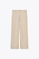 STRIPED PANTS WITH BRAIDED BELT