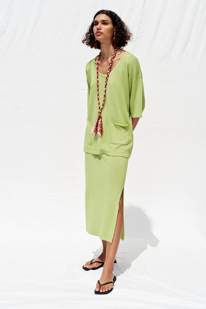 TOP OVERSIZE EN MAILLE MANCHES COURTES