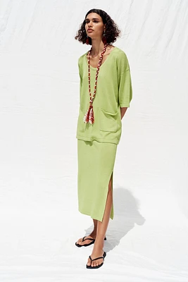 TOP OVERSIZE EN MAILLE MANCHES COURTES