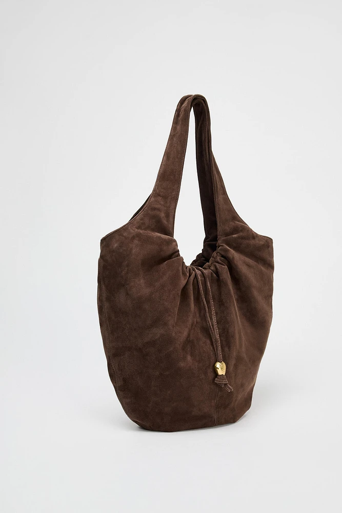 RUCHED SPLIT LEATHER BUCKET BAG