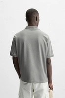 TEXTURED ZIP POLO SHIRT