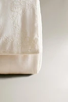 QUILTED EMBROIDERED TOILETRY BAG