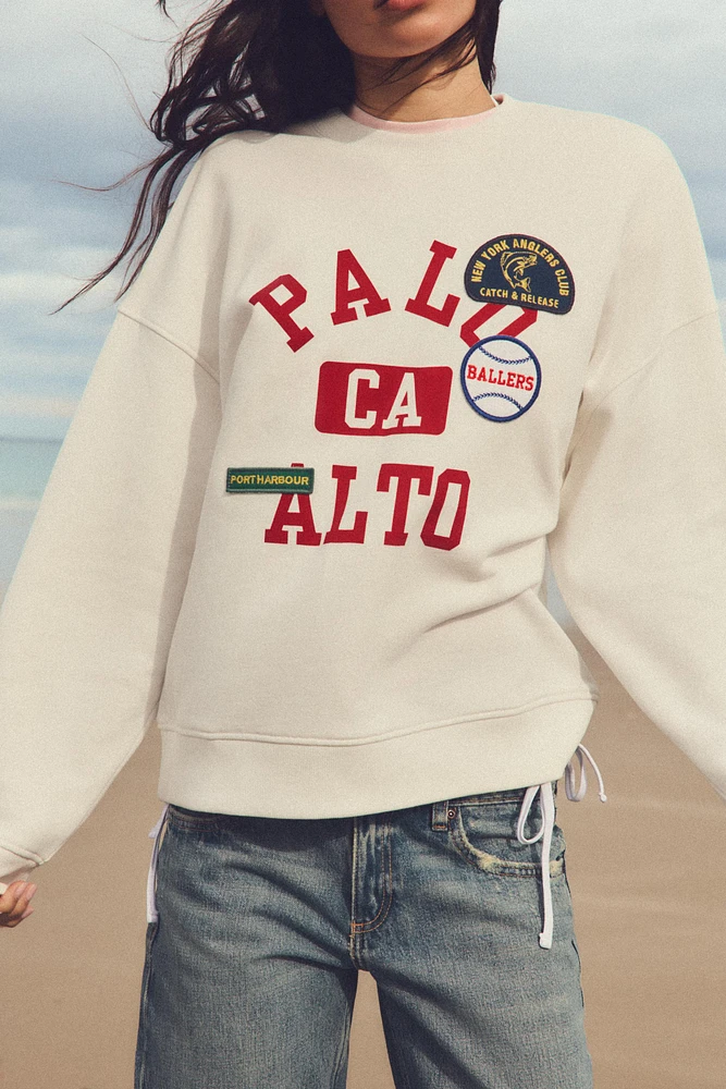 SWEATSHIRT WITH PATCHES