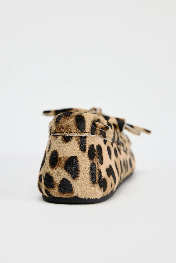 ANIMAL PRINT FUR LINED LEATHER LOAFERS