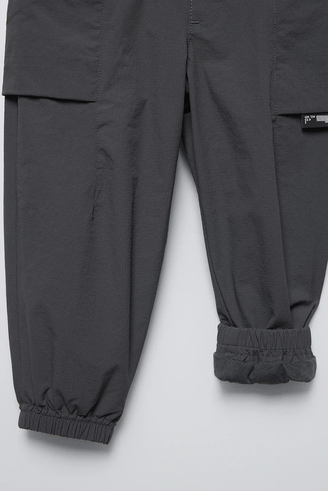 PANTALON TECHNIQUE DOUBLÉ ÉTIQUETTE