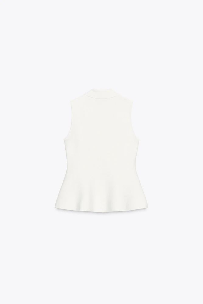 TOP GILET EN MAILLE PÉPLUM