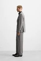 LIMITED EDITION TEXTURED SUIT PANTS