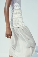 COMBINATION MIDI SKIRT