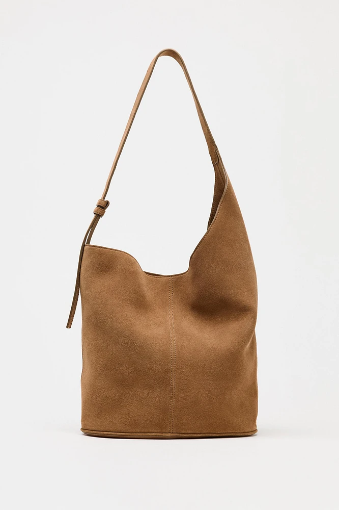 SAC SEAU SOFT ASYMÉTRIQUE EN CROÛTE DE CUIR