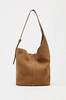 SAC SEAU SOFT ASYMÉTRIQUE EN CROÛTE DE CUIR