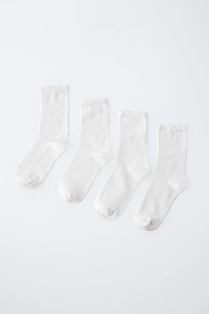 LOT DE QUATRE CHAUSSETTES LONGUES