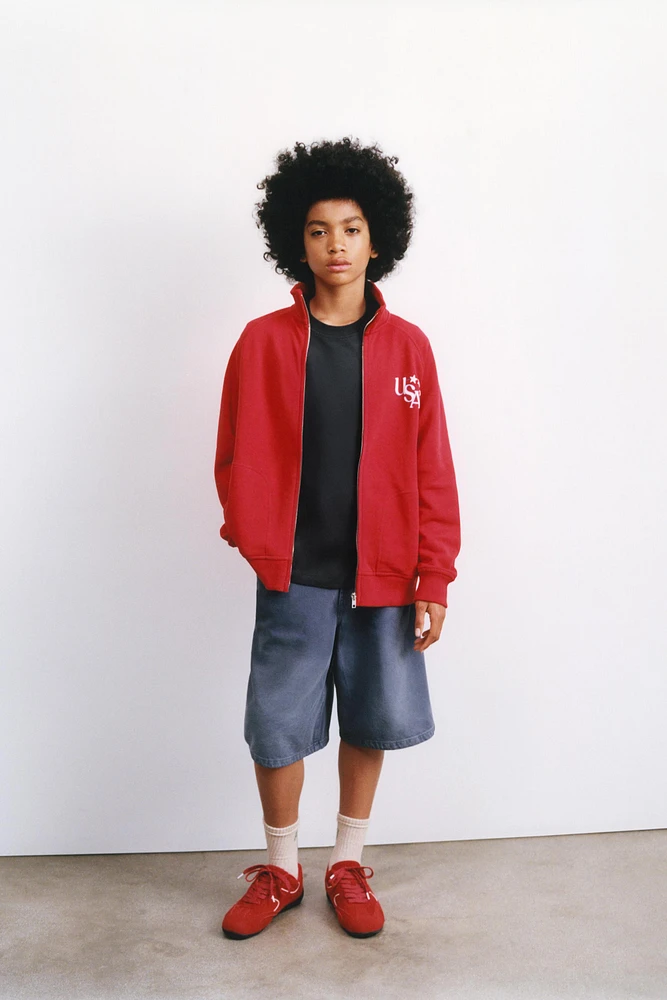 RAISED PRINT ZIP-UP SWEATSHIRT