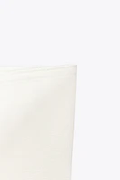 TOP BANDEAU EN MAILLE UNIE