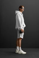 SWEAT À CAPUCHE ET ZIP