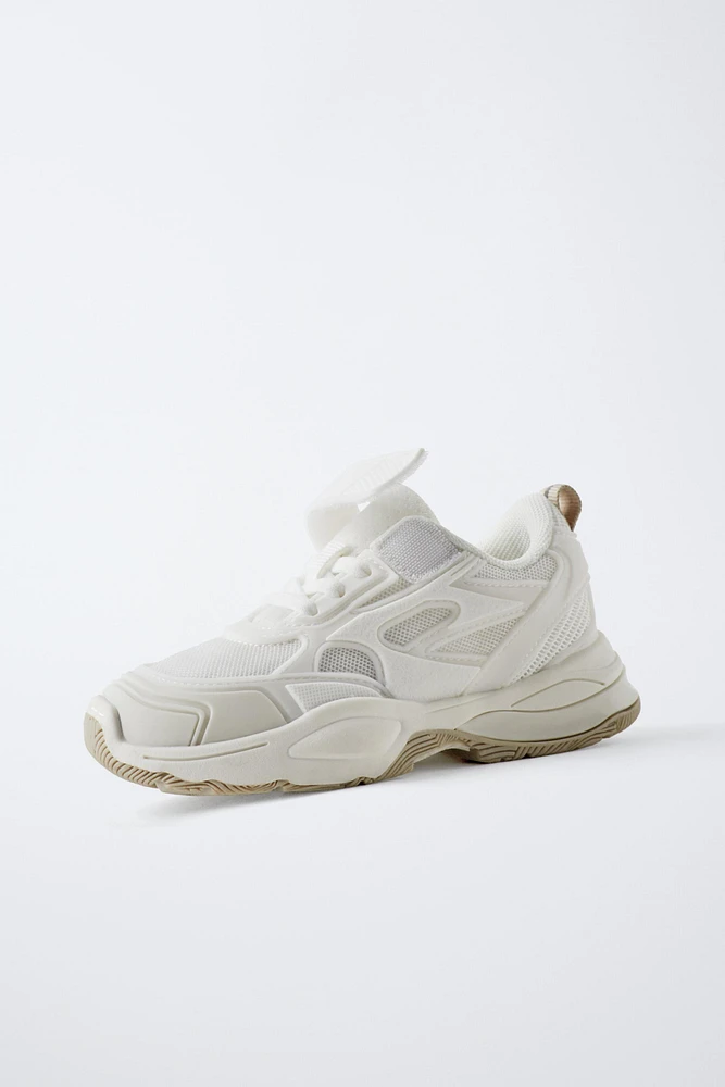 TENNIS MULTI-PIÈCES