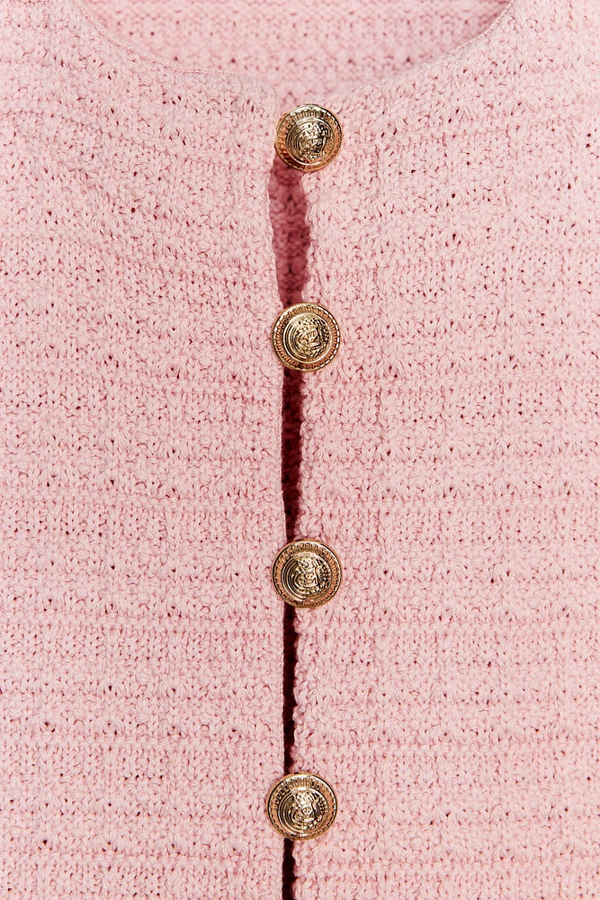 GILET EN MAILLE À VOLANTS