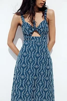 ROBE MIDI BRODERIES AJOURÉES EFFET GOMME