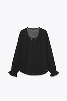 BLOUSE SEMI-TRANSPARENTE