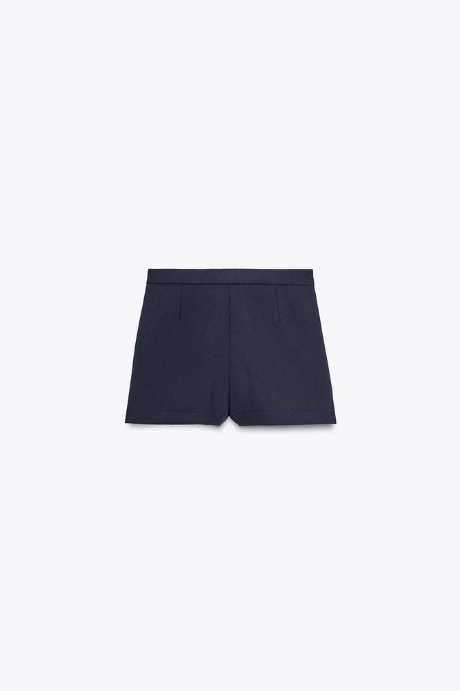 SPLIT SKIRT WITH BUTTONS