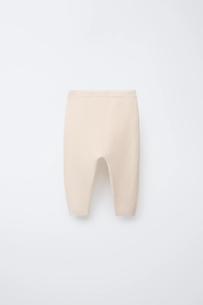 PANTALON EN MAILLE LINKS FLEURS BRODÉES