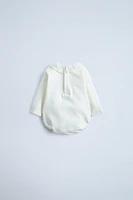 COMBINATION PLUSH BODYSUIT WITH PETER PAN COLLAR