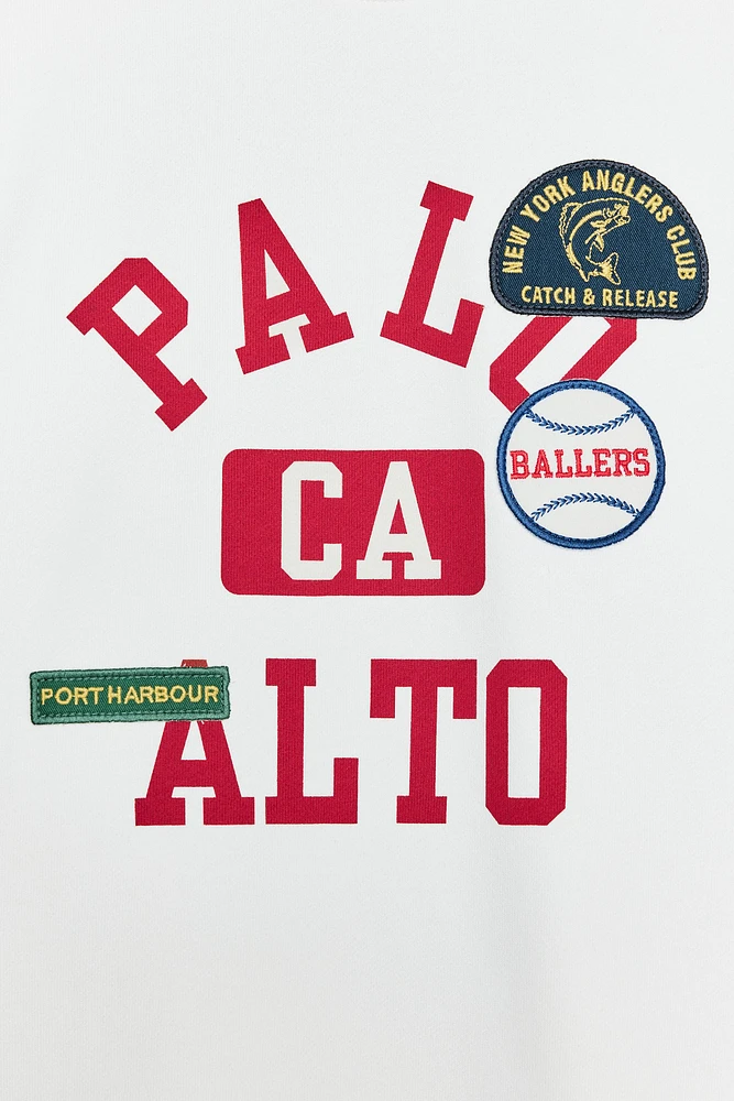 SWEATSHIRT WITH PATCHES