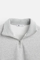 BASIC QUARTER ZIP SWEATSHIRT