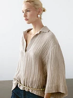 Blouse fluide col ouvert en lin mélangé