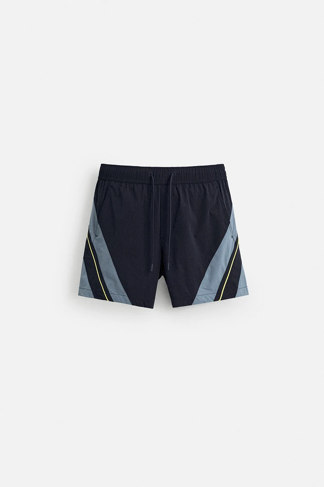 CONTRAST BANDS MID-LENGTH SWIMSUIT