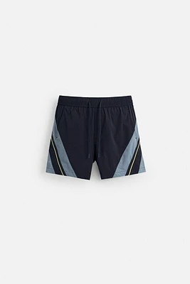 CONTRAST BANDS MID-LENGTH SWIMSUIT