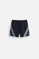 CONTRAST BANDS MID-LENGTH SWIMSUIT