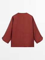 Blouse à col en V 100 % lin