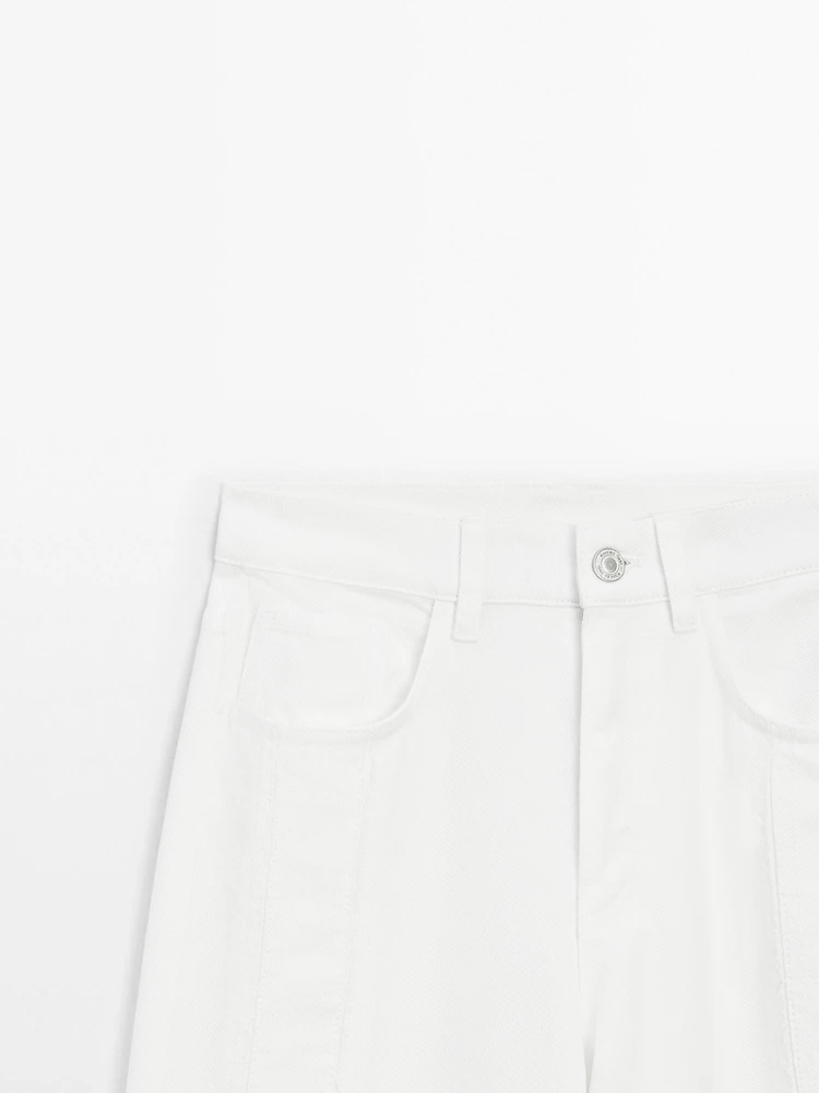 Jean wide leg taille haute avec découpes