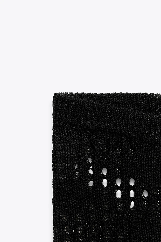 PANTALON EN MAILLE POINTELLE LATÉRAL