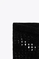 PANTALON EN MAILLE POINTELLE LATÉRAL